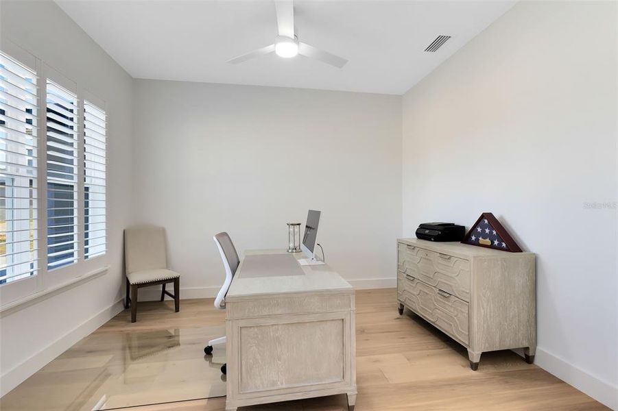 Upon entering, you’ll find a dedicated den/office, perfect for working from home or creating a quiet retreat.