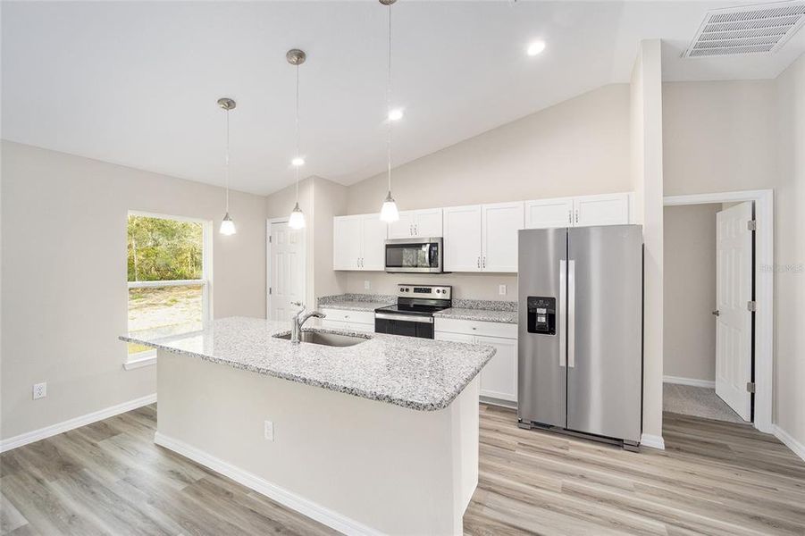 Furnished interior view inside a new home in , Dunnellon (Image 8).