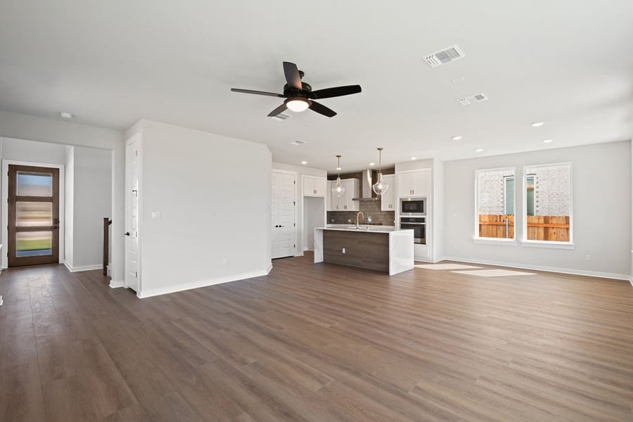 Spacious, unfurnished interior of a new home in Terrace Collection at Heritage, Dripping Springs (Image 18).