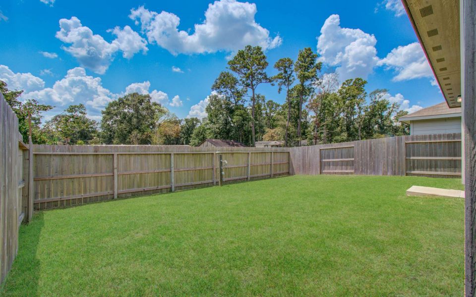 Front exterior of a new home in Tavola: Cottage Collection, New Caney, TX, highlighting curb appeal (Image 20).