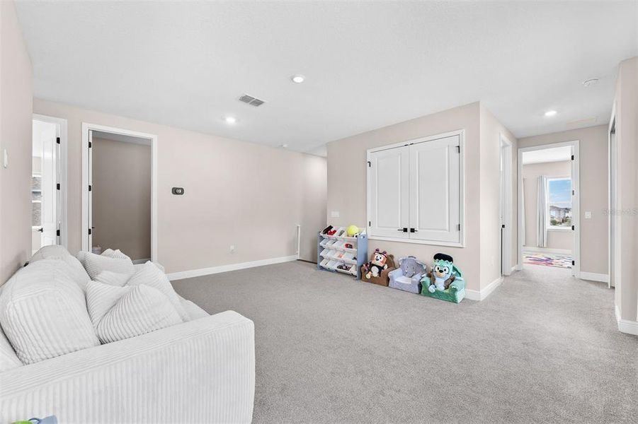 Furnished interior view inside a new home in Laureate Park, Orlando (Image 37).