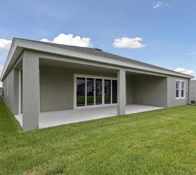Front exterior of a new home in Waterset, Apollo Beach, FL, highlighting curb appeal (Image 2).