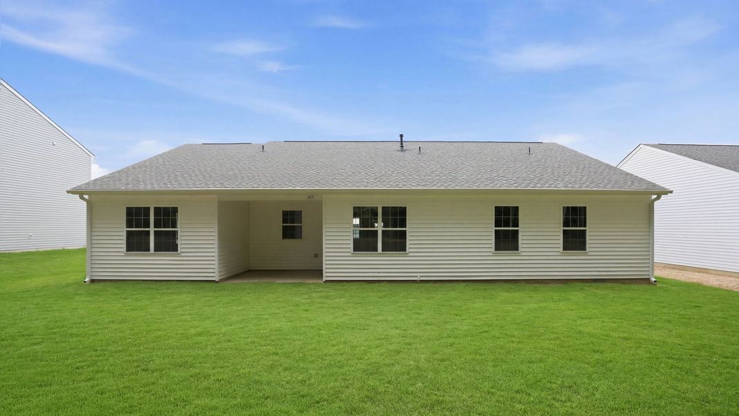 Exterior details and patio area of a home in Tyler - Home on the Lake, New Bern (Image 3).