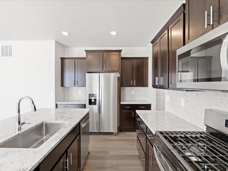 Furnished interior view inside a new home in Paint Brush Hills, Peyton (Image 4).