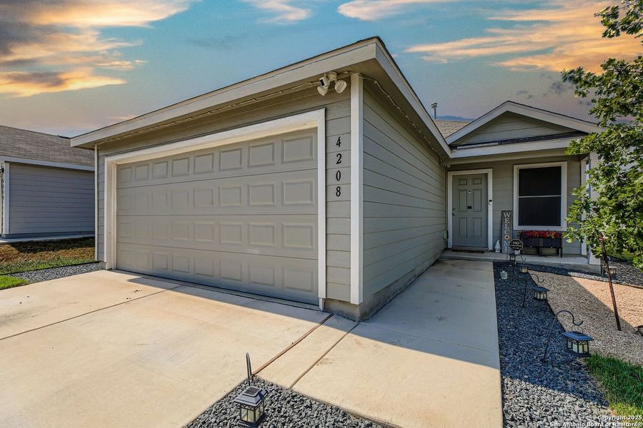 Front exterior of a new home in , San Antonio, TX, highlighting curb appeal (Image 22). Front exterior of a new home in , San Antonio, TX, highlighting curb appeal (Image 22).