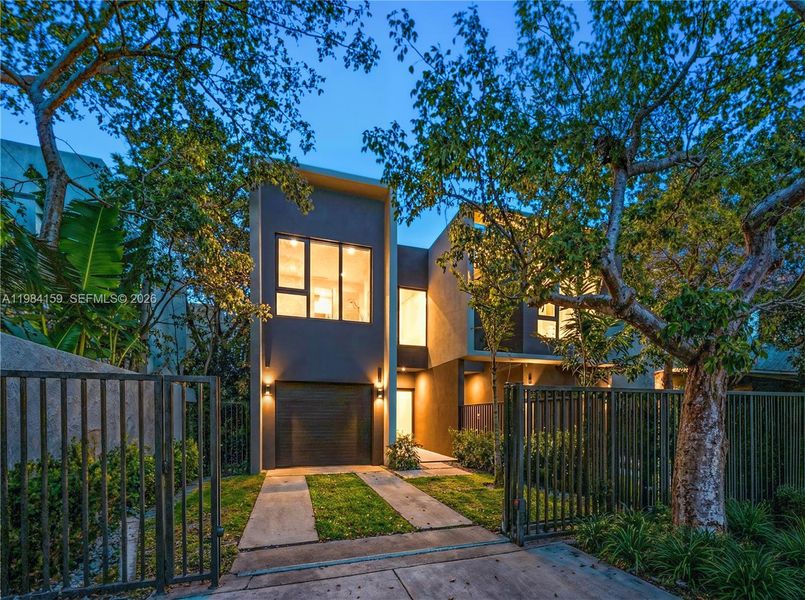 Front exterior of a new home in , Miami, FL, highlighting curb appeal (Image 2). Front exterior of a new home in , Miami, FL, highlighting curb appeal (Image 2).