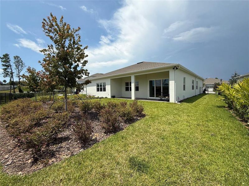 Front exterior of a new home in , Montverde, FL, highlighting curb appeal (Image 22). Front exterior of a new home in , Montverde, FL, highlighting curb appeal (Image 22).