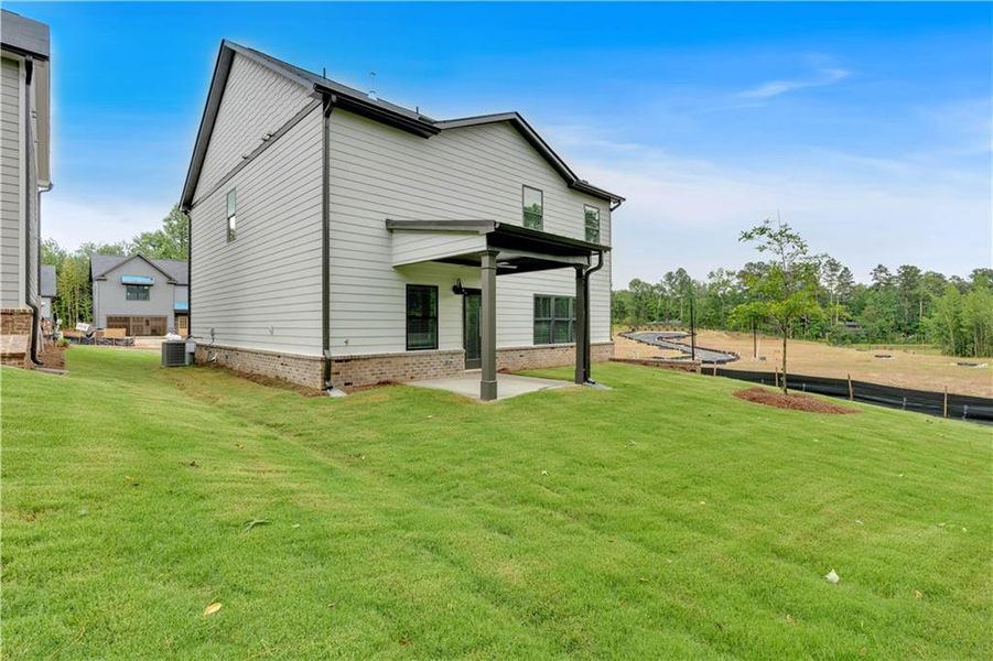 Exterior details and patio area of a home in Meadow Pines, Dallas (Image 17).