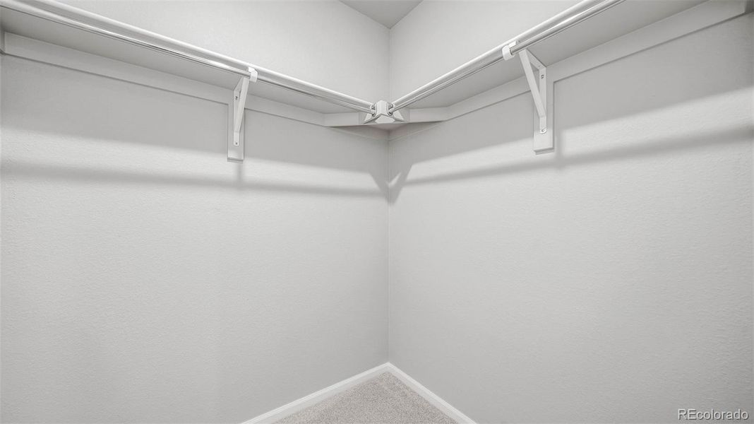 Spacious, unfurnished interior of a new home in Thompson River Ranch, Johnstown (Image 22).