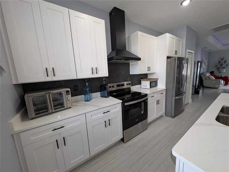 Furnished interior view inside a new home in , Poinciana (Image 38).