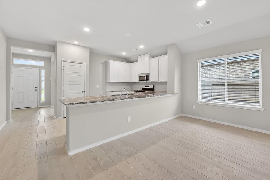 Furnished interior view inside a new home in Grand Magnolia, Magnolia (Image 15).