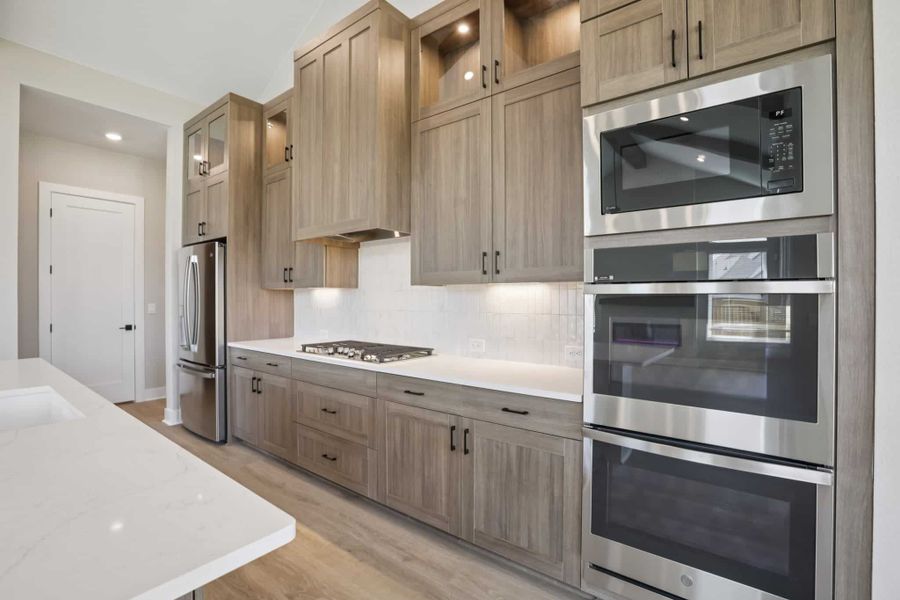 Furnished interior view inside a new home in 6 Creeks, Kyle (Image 14).