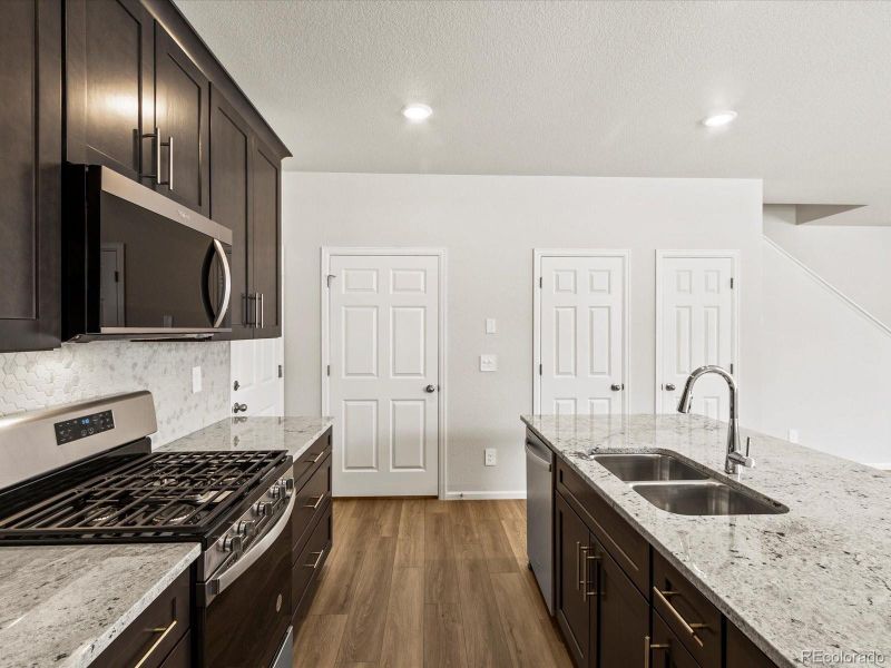 Furnished interior view inside a new home in Skyview at High Point, Aurora (Image 15).