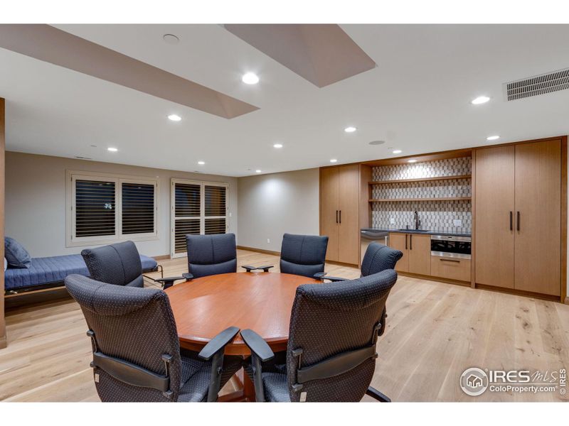 Upper loft near garage has a Murphy bed. This space can easily be a 6th bedroom