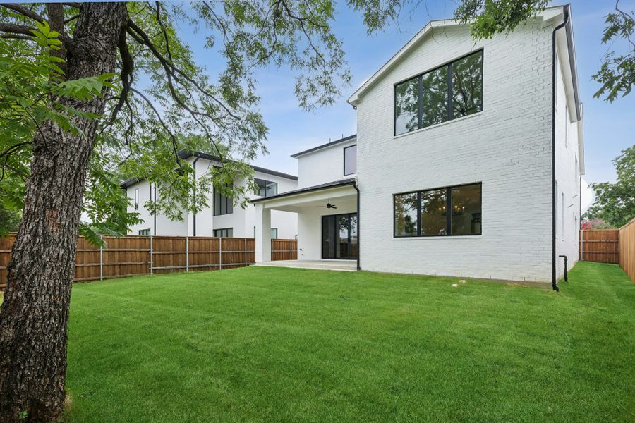 Front exterior of a new home in , Dallas, TX, highlighting curb appeal (Image 57).