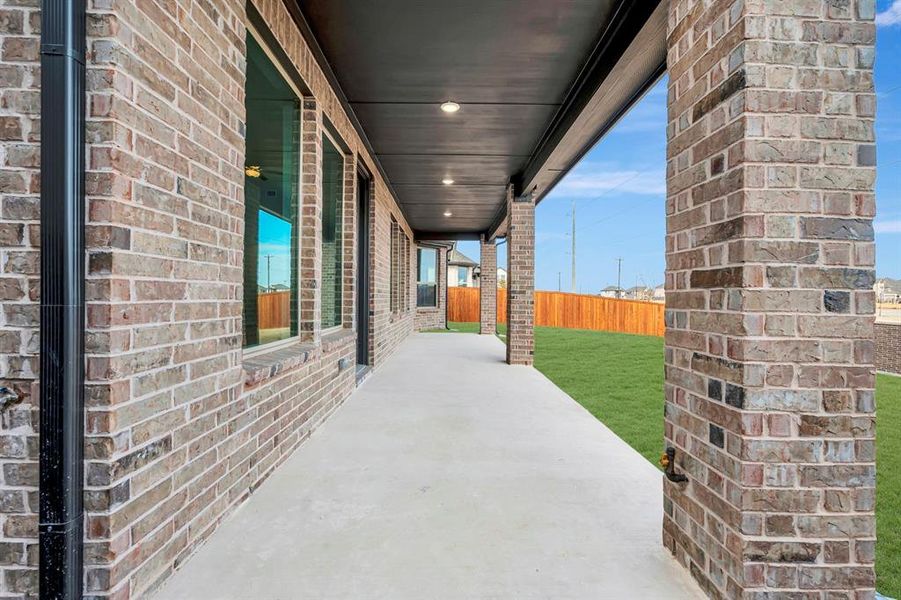 Exterior details and patio area of a home in Lilyana, Celina (Image 4).