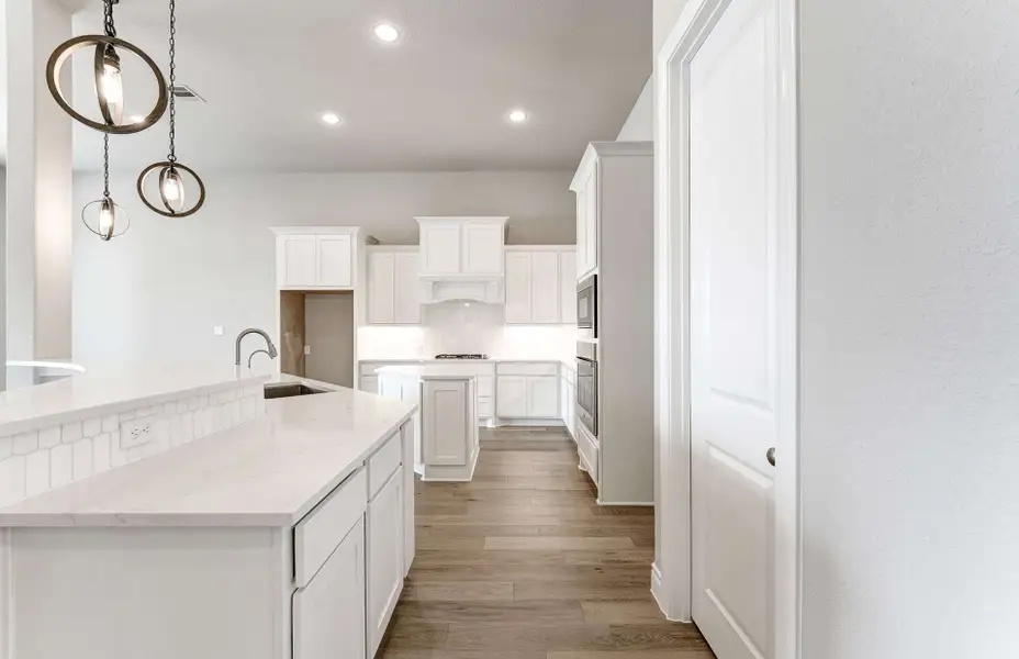 Representative furnished interior of a home built from the 2909 by Ravenna Homes in The Woodlands Hills 65′, Willis (Image 8). Representative furnished interior of a home built from the 2909 by Ravenna Homes in The Woodlands Hills 65′, Willis (Image 8).