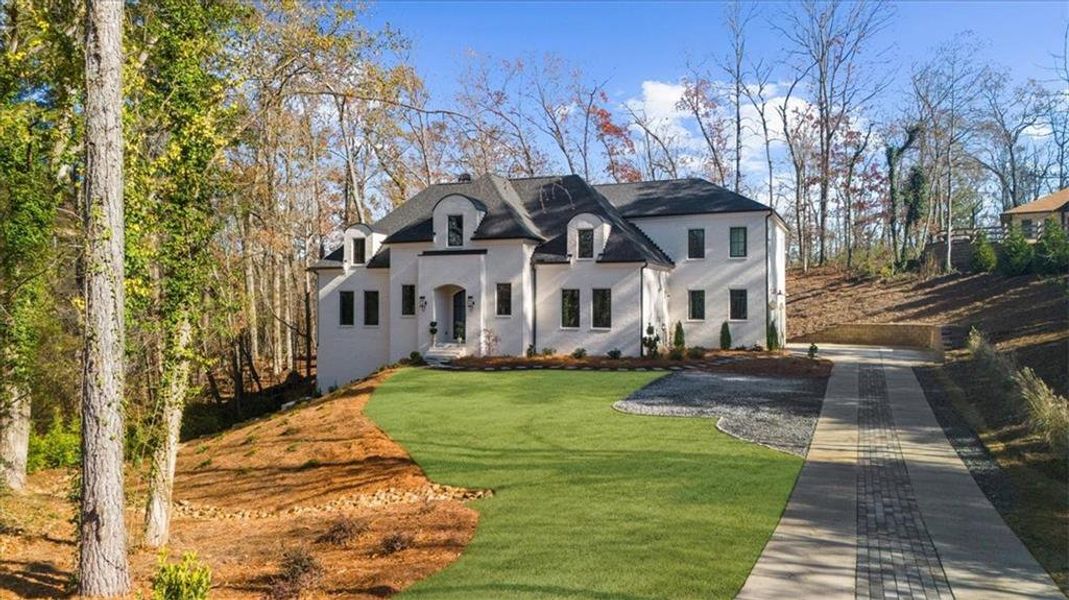 Front exterior of a new home in , Roswell, GA, highlighting curb appeal (Image 27). Front exterior of a new home in , Roswell, GA, highlighting curb appeal (Image 27).