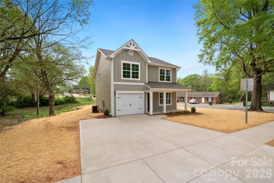 Front exterior of a new home in , Monroe, NC, highlighting curb appeal (Image 17). Front exterior of a new home in , Monroe, NC, highlighting curb appeal (Image 17).