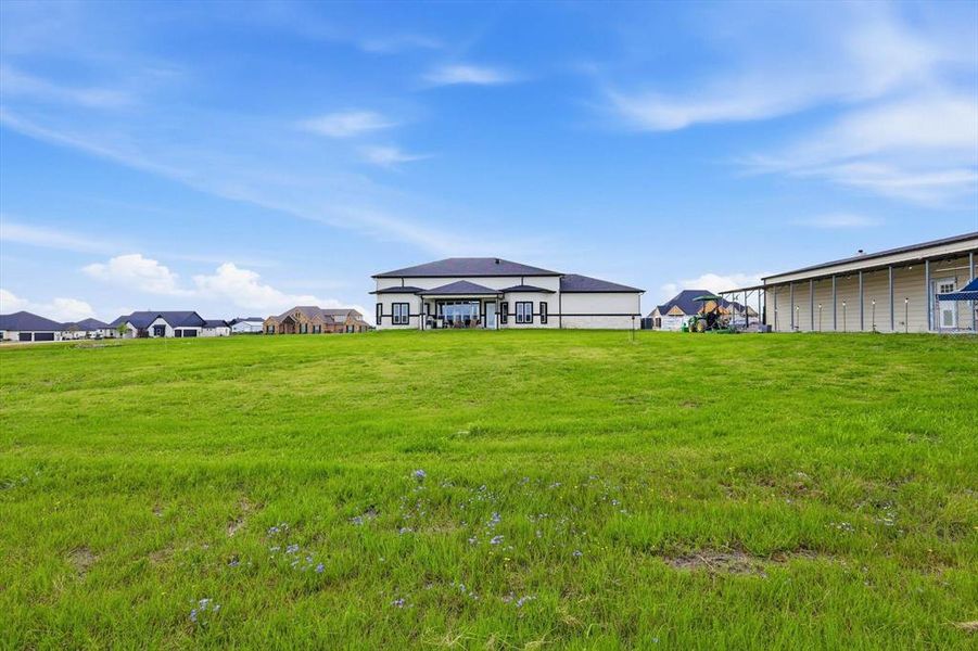 Exterior details and patio area of a home in , Royse City (Image 23).