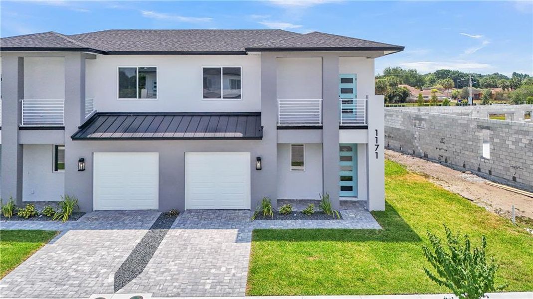 Front exterior of a new home in , Lakeland, FL, highlighting curb appeal (Image 24). Front exterior of a new home in , Lakeland, FL, highlighting curb appeal (Image 24).