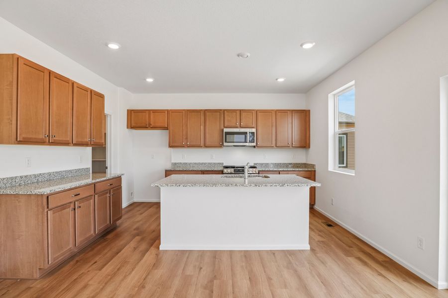 Furnished interior view inside a new home in The Cottages Collection at Ridgeline Vista, Brighton (Image 5).