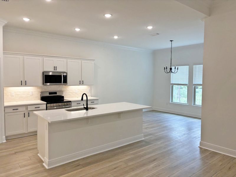 Furnished interior view inside a new home in Young Oaks, Crestview (Image 7).