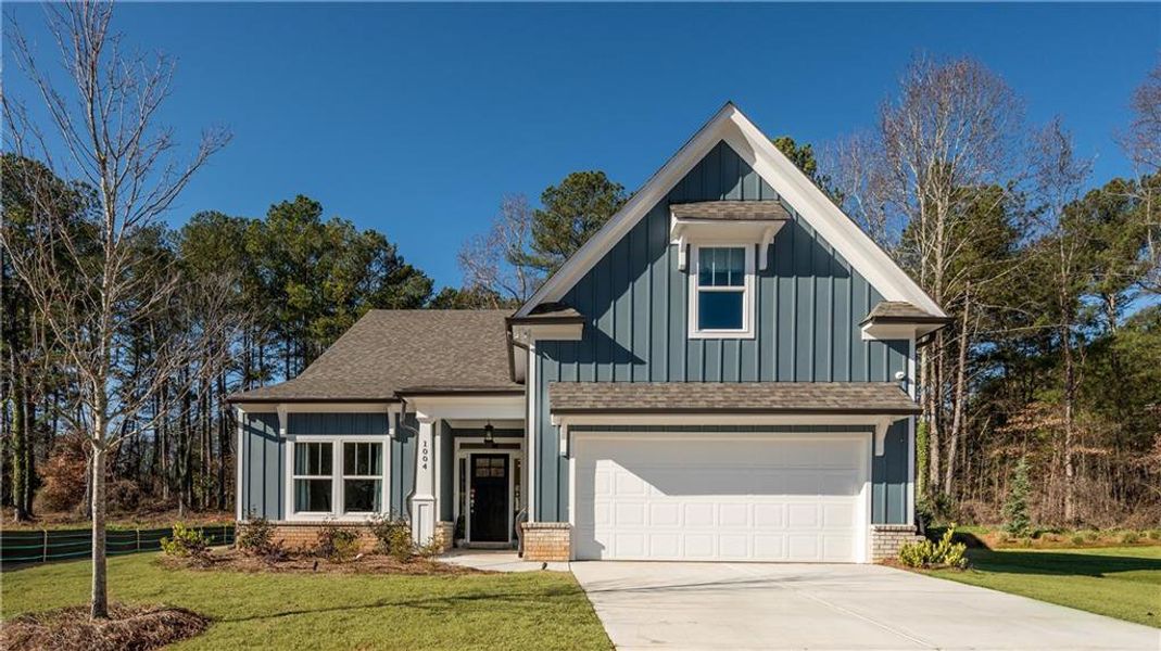 Front exterior of a new home in , Canton, GA, highlighting curb appeal (Image 23).