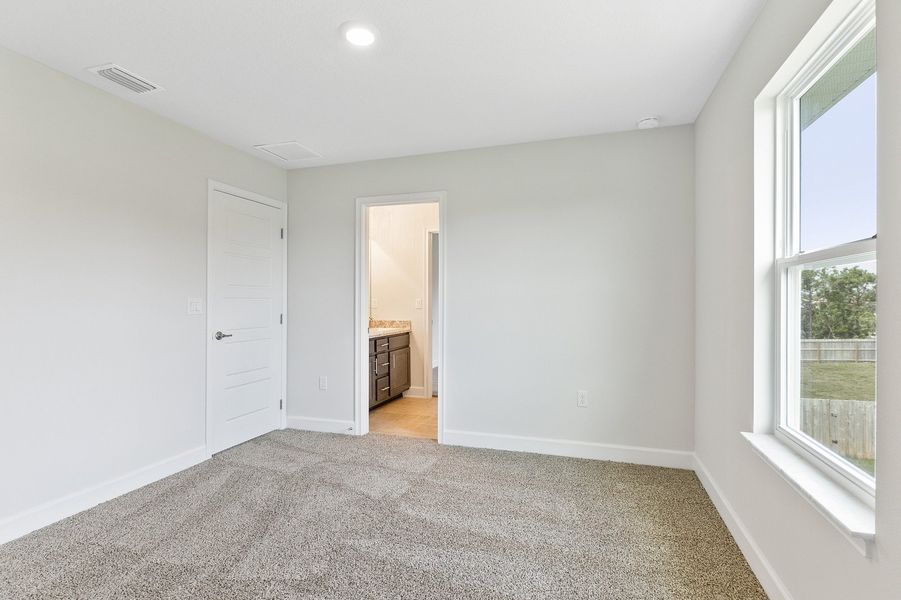Representative unfurnished interior of a home built from the 2705 by Adams Homes in Winding Oaks, Weeki Wachee (Image 31).