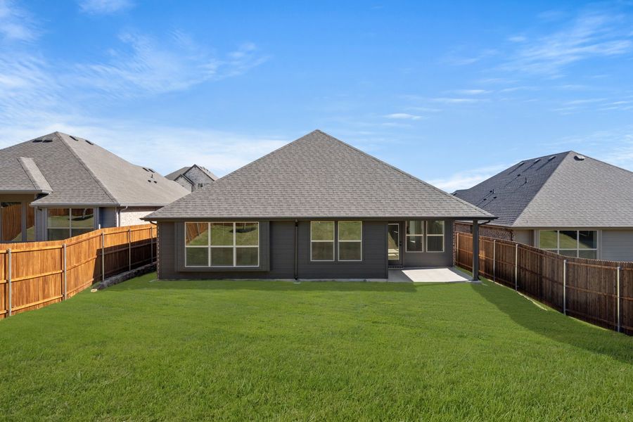 Exterior details and patio area of a home in Waterford Park, Weatherford (Image 21).