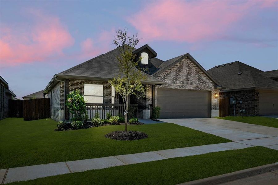 Front exterior of a new home in Chisholm Hills, Cleburne, TX, highlighting curb appeal (Image 2).