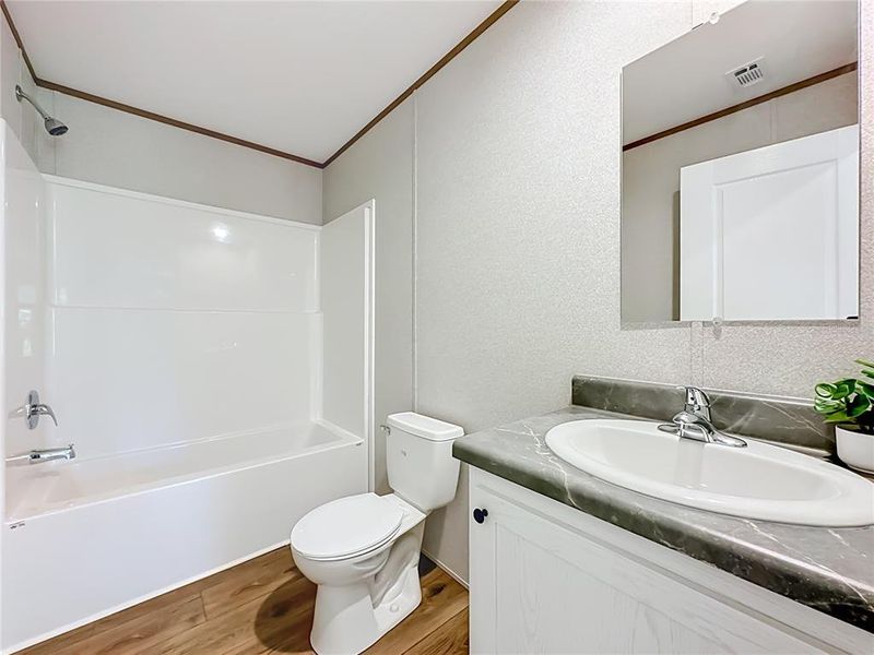 Furnished interior view inside a new home in , Satsuma (Image 9).