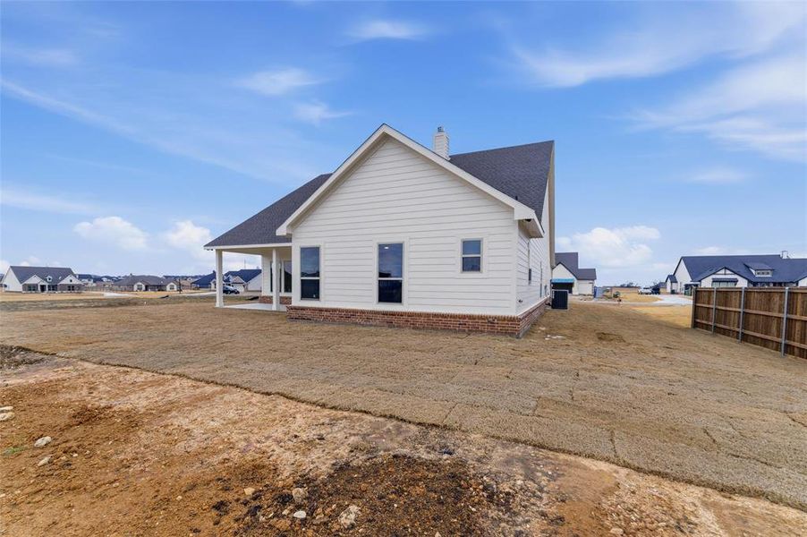 Exterior details and patio area of a home in Fairview Meadows, New Fairview (Image 18).