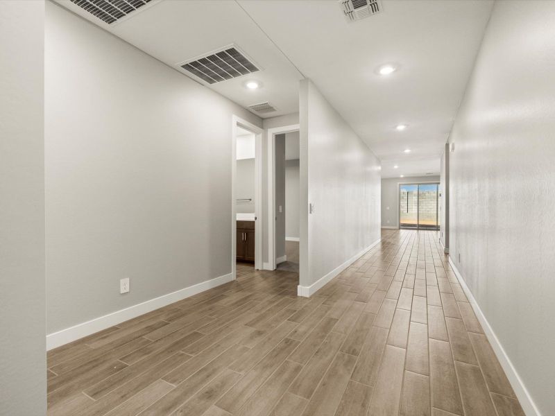 Spacious, unfurnished interior of a new home in White Tank Foothills Signature Series, Waddell (Image 11).