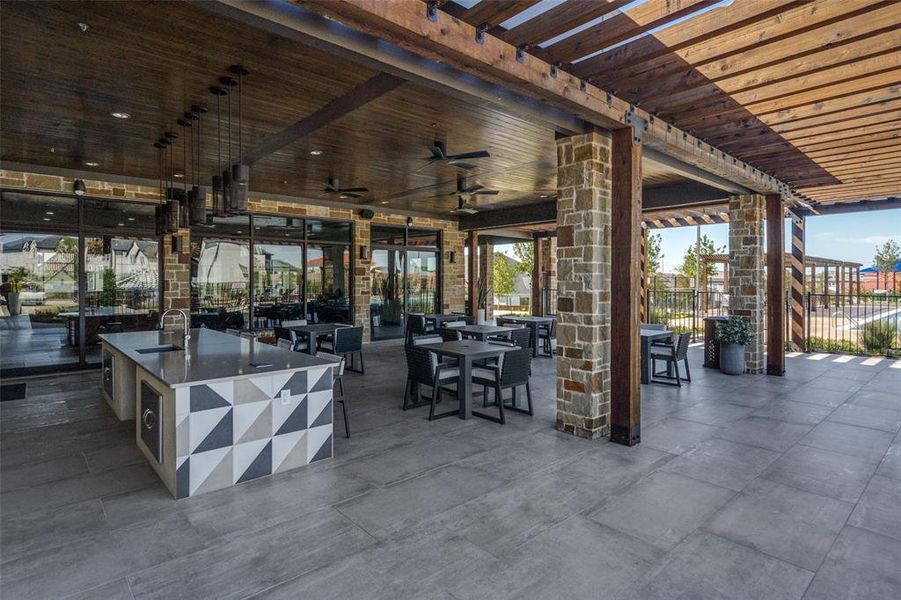 View of patio / terrace featuring a sink and ceiling fan View of patio / terrace featuring a sink and ceiling fan
