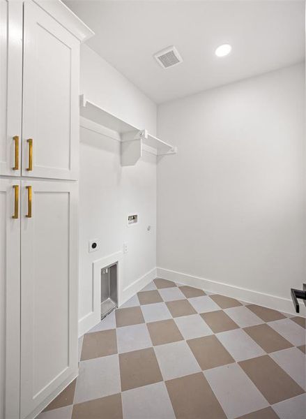 Utility room featuring white cabinetry with gold-finish hardware, open shelving, recessed lighting, and a checkerboard pattern floor