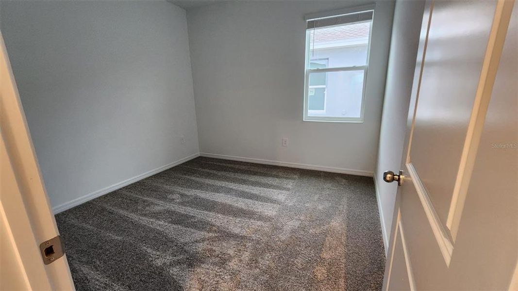 Spacious, unfurnished interior of a new home in Knightsbridge, Kissimmee (Image 12).