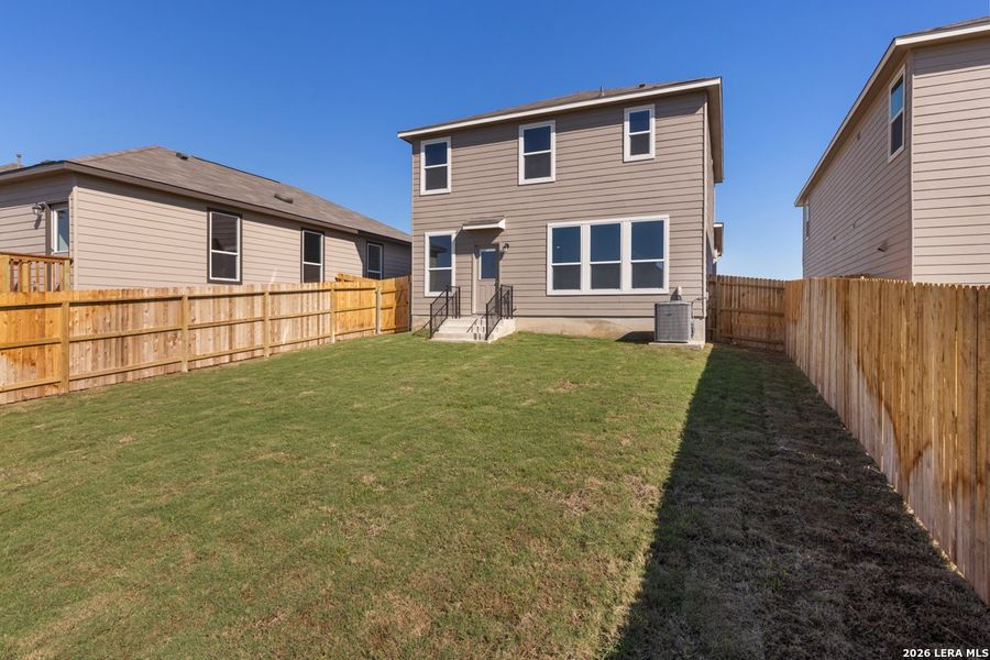 Exterior details and patio area of a home in Knox Ridge, Converse (Image 3).