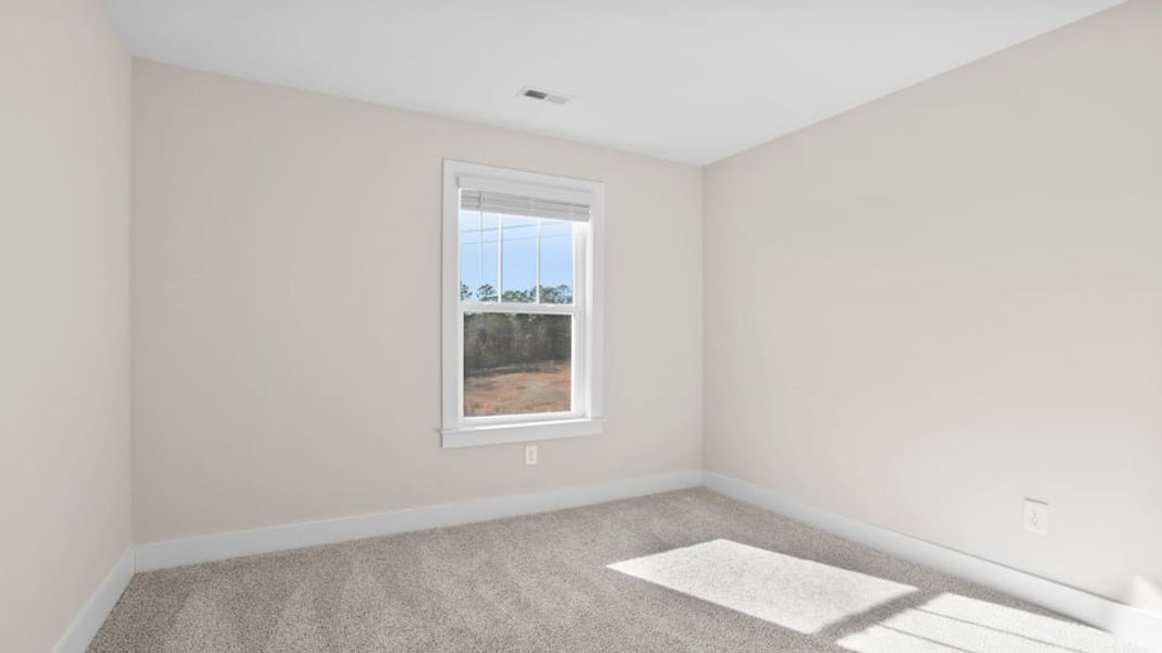 Spacious, unfurnished interior of a new home in Rutledge Estates, Woodruff (Image 24).