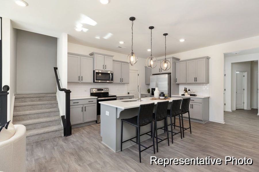 Furnished interior view inside a new home in Village Heights TH, Greensboro (Image 3).