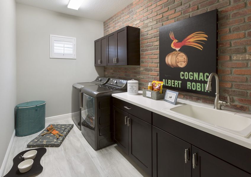 Representative furnished interior of a home built from the Laurel 2 by Neal Communities in Palm Grove, Bradenton (Image 8).