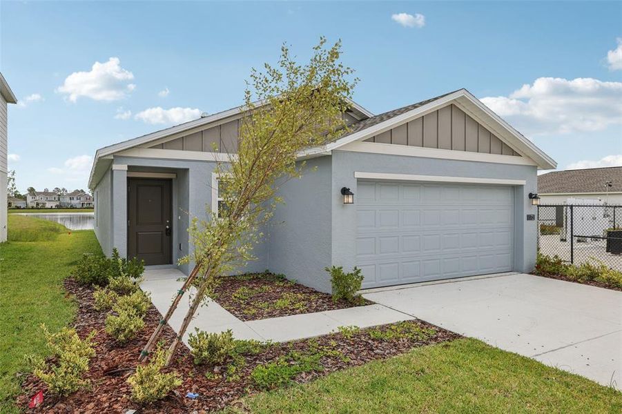 Front exterior of a new home in , Daytona Beach, FL, highlighting curb appeal (Image 20).