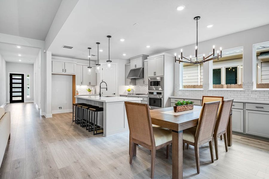 Furnished interior view inside a new home in 6 Creeks, Kyle (Image 9).