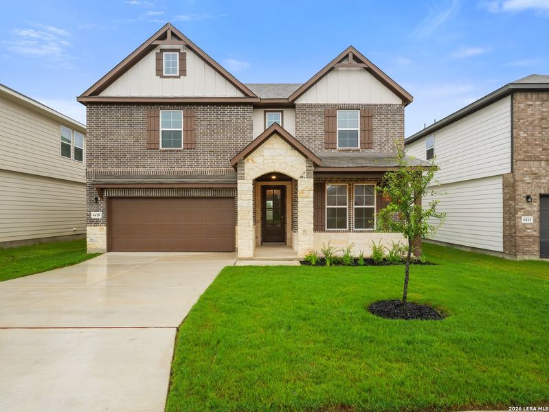 Front exterior of a new home in Morgan Meadows, San Antonio, TX, highlighting curb appeal (Image 1). Front exterior of a new home in Morgan Meadows, San Antonio, TX, highlighting curb appeal (Image 1).
