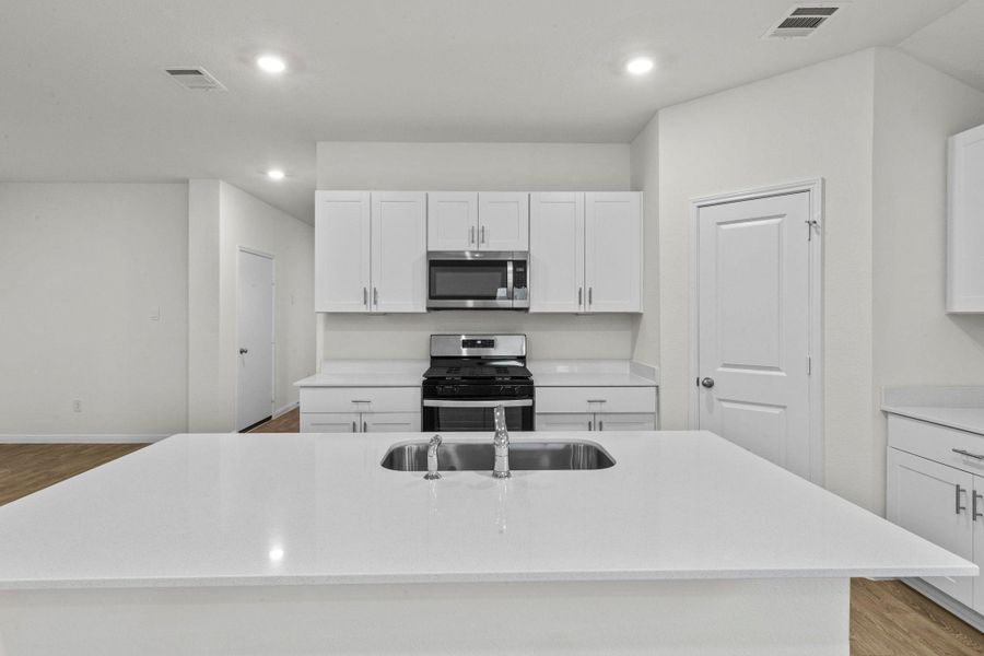 Furnished interior view inside a new home in Trace, San Marcos (Image 6).