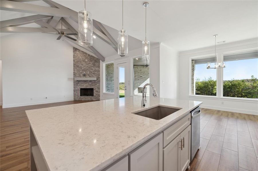 Kitchen featuring white cabinetry, sink, and dark hardwood / wood-style floors