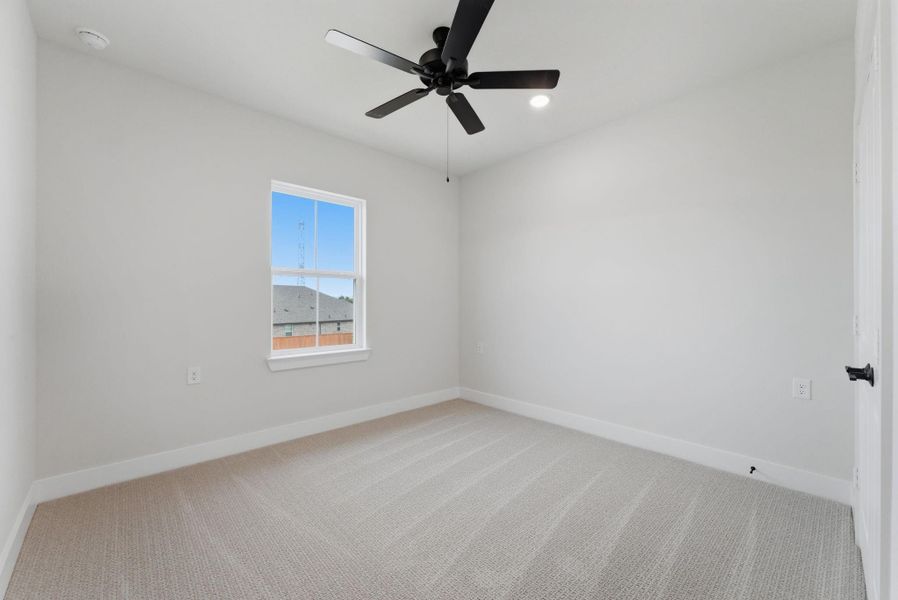 Spacious, unfurnished interior of a new home in Towne Lake, Cypress (Image 24).