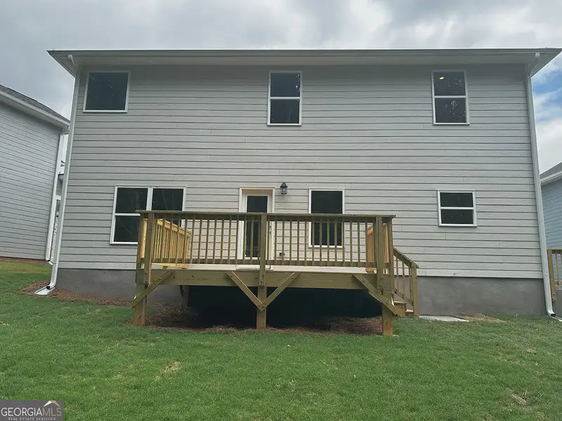 Front exterior of a new home in Canterbury Villas, Carrollton, GA, highlighting curb appeal (Image 11).