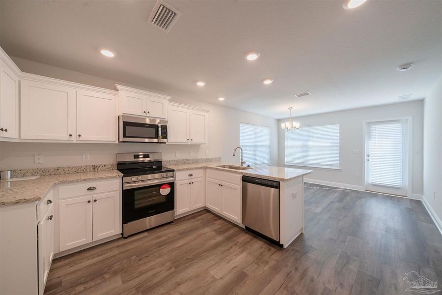 Furnished interior view inside a new home in Allison Acres, Cantonment (Image 5).
