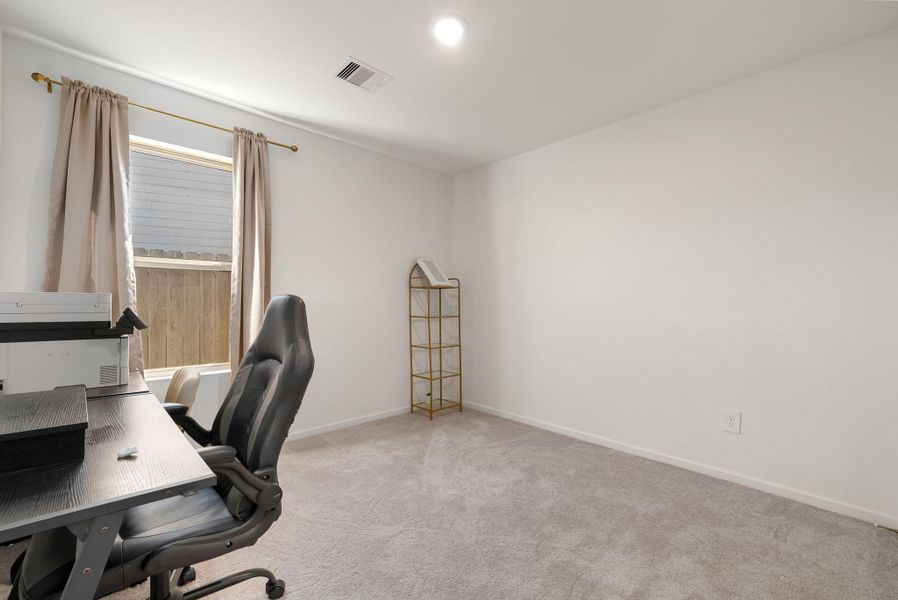 Furnished interior view inside a new home in Ladera Trails, Conroe (Image 19).